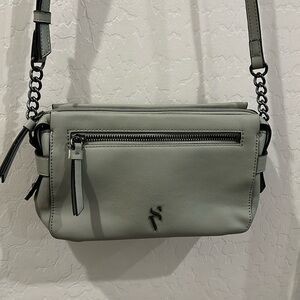 Simply Vera small crossbody purse. Gray color with two outside compartments.